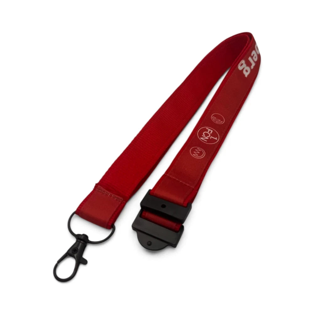 Am Ball 1. FC Nürnberg Lanyard in Rot und Weiß mit Vereinslogo und schwarzem Karabinerhaken