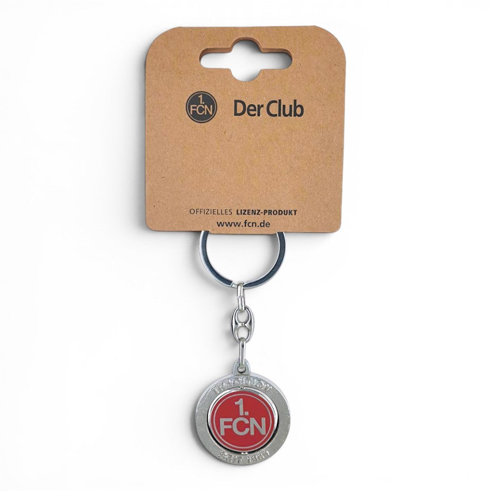 Am Ball 1. FC Nürnberg Schlüsselanhänger aus Zamak mit drehbarem Logo und Inschrift Tradition seit 1900 auf Karte