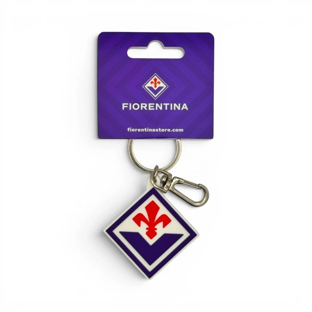 Am Ball ACF Fiorentina Schlüsselanhänger aus PVC mit dem offiziellen Vereinslogo in Rautenform auf weißem Grund