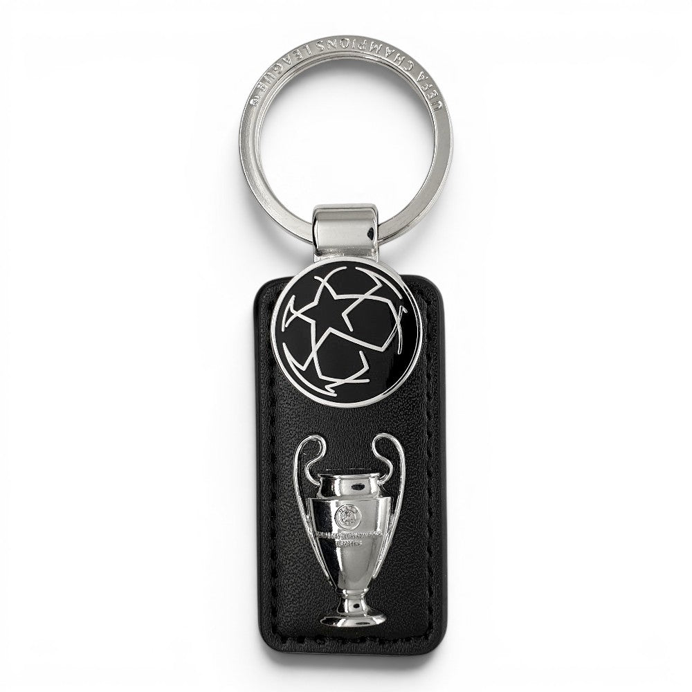 Am Ball UEFA Champions League Schlüsselanhänger aus schwarzem Leder mit silbernem Pokal-Motiv und Starball-Emblem