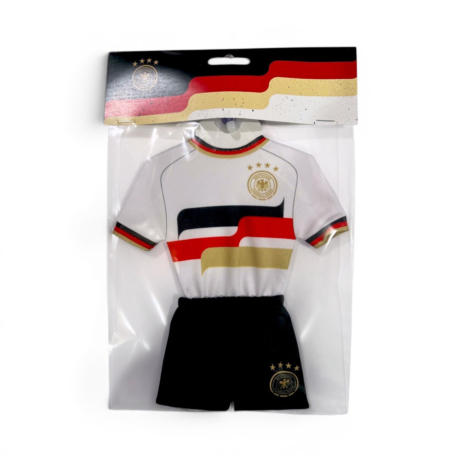 Am Ball DFB Mini-Trikot-Set in Weiß und Schwarz mit vier Sternen in offizieller Verpackung für Fans.