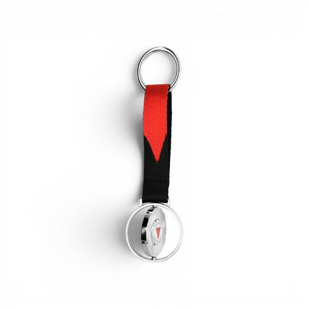 Am Ball DFL Virtual Bundesliga Schlüsselanhänger aus Zamak mit rot-schwarzem Band und Logo-Medaillon.