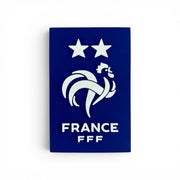 FFF Kühlschrankmagnet in Blau mit weißem gallischen Hahn, zwei Sternen und FRANCE FFF Schriftzug aus PVC.