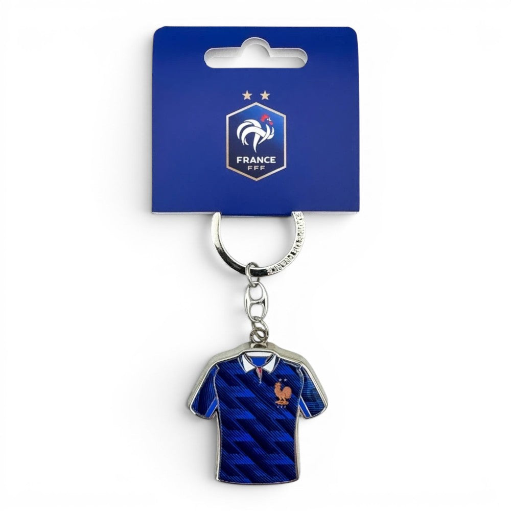Schlüsselanhänger in Form eines blauen Frankreich-Trikots mit "France FFF" Logo und integriertem Einkaufswagenchip, aus Zamak.