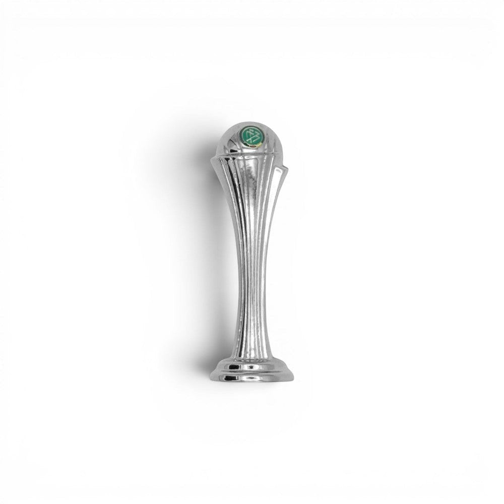 Detailed silver Women's DFB Pokal trophy standing alone, showcasing a high-quality metallic finish
